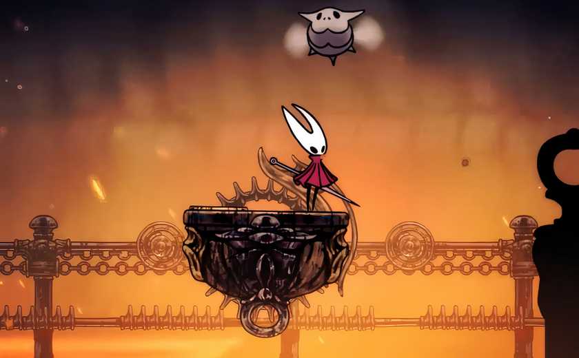 The hornet riding a cart with a bug hovering above.