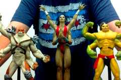An image of models for Mortal Kombat characters. They are non-human, muscular, and have four arms.