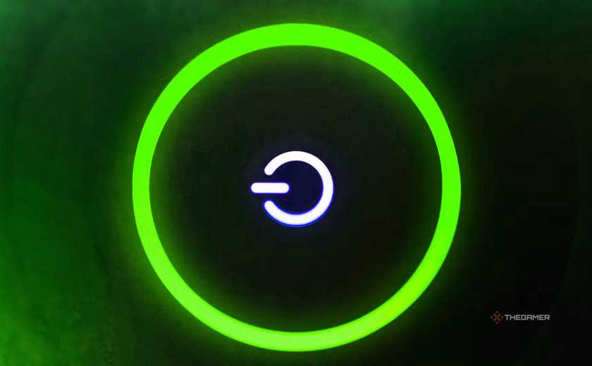 Xbox red ring of death lit up in green.